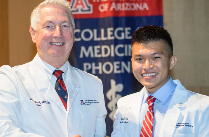 Dean Guy Reed, MD, MS, with Allen Doan at the Class of 2022 White Coat Ceremony