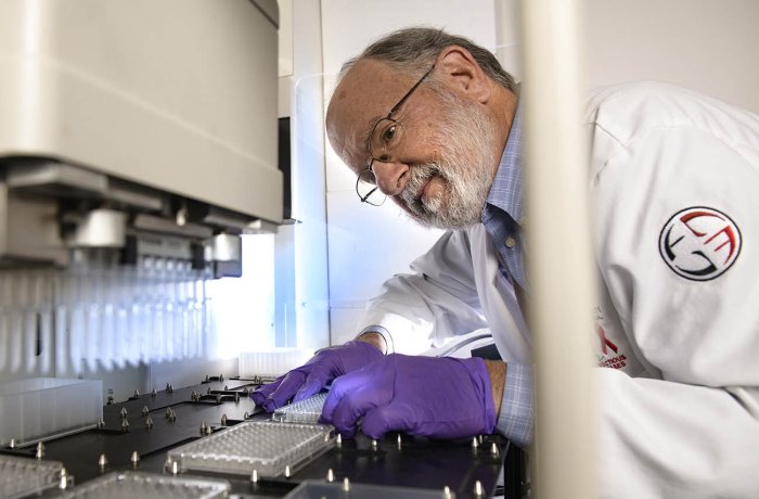 John Galgiani, MD, working in his lab (Photo credit: Kris Hanning, Multimedia Photojournalism manager, UAHS)
