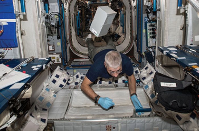 An Astronaut Floats through his ship