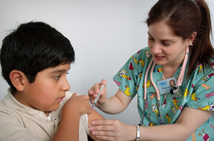 A boy receives an intramuscular injection (Source: Centers for Disease Control and Prevention)