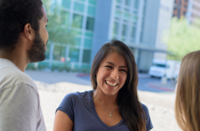 Three Medical Students Talk outside of HSEB