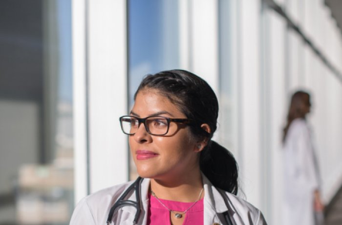 A Medical Student Stares Out of a Window