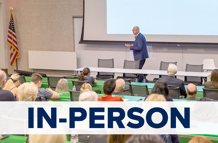 A Man Delivering a Lecture in a Lecture Hall