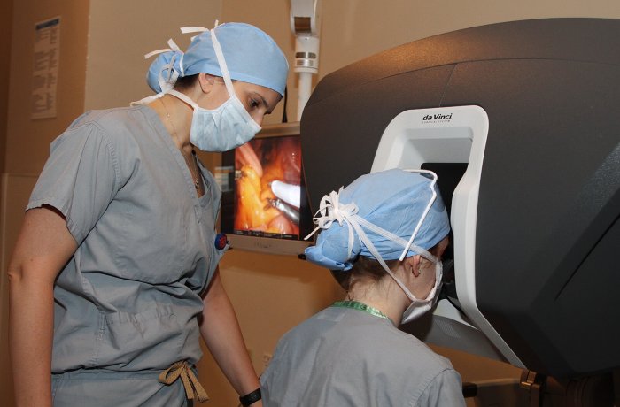 Surgery Residents Working with the Surgical Robotics Device