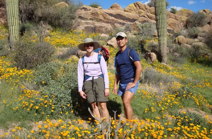 two people are hiking