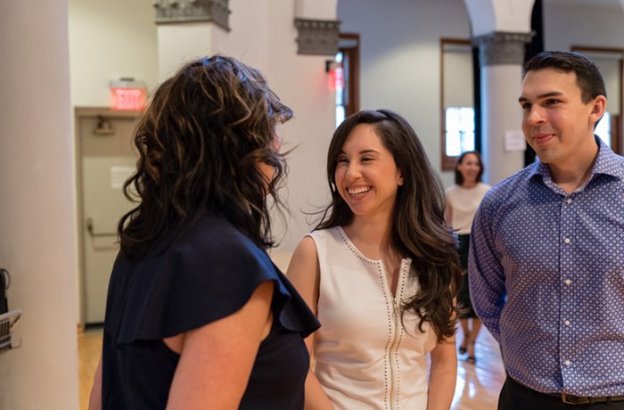 Dr. Aquayo Talks with Dr. Cheryl O'Malley at the Graduation Ceremony