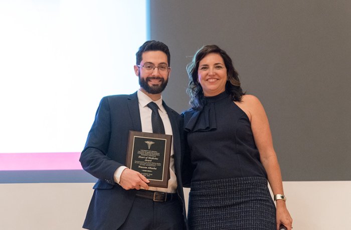 Dr. Albasha with Dr. Cheryl O'Malley at the Graduation