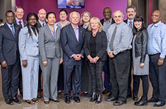 group photo of individuals from both universities