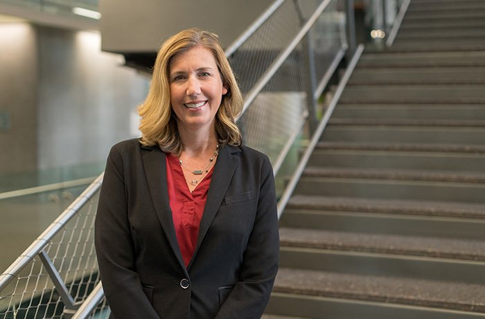 Katie Brite, MD, Stands at the Foot of the Steps in the HSEB