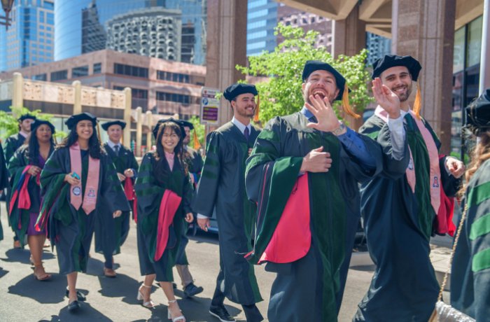 The Class of 2024 processes to the Orpheum Theatre for their Commencement Ceremony