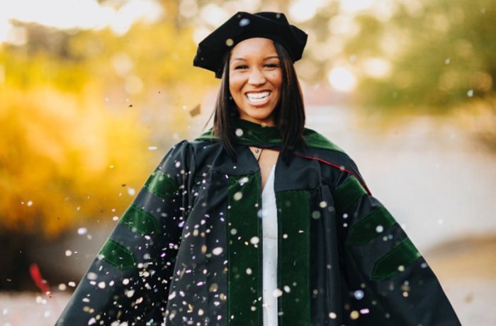 Cox Wearing Her Regalia for Commencement