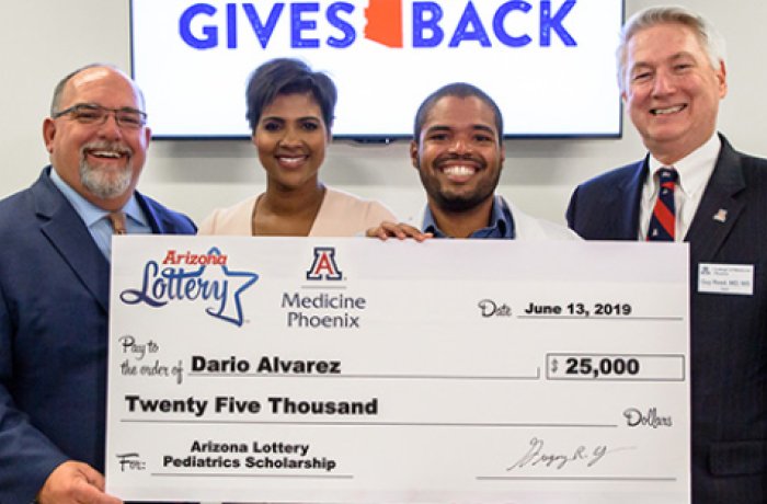 Dario with a Representative from the Arizona Lottery and Dean Reed