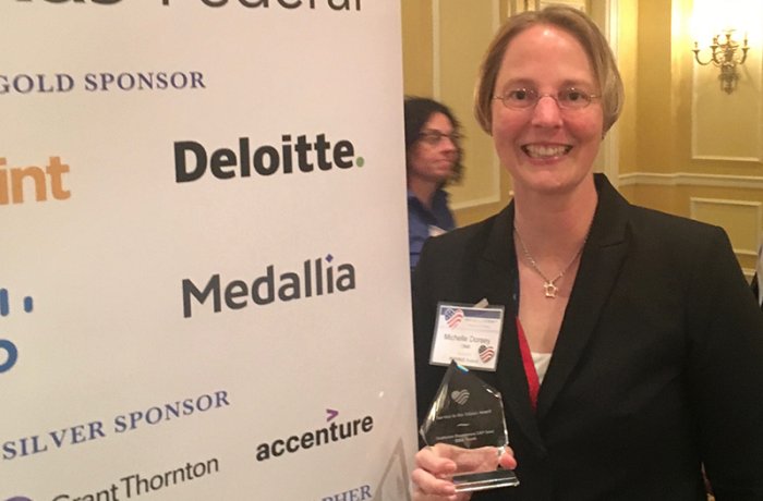 Michelle Dorsey, MD, with Her Award