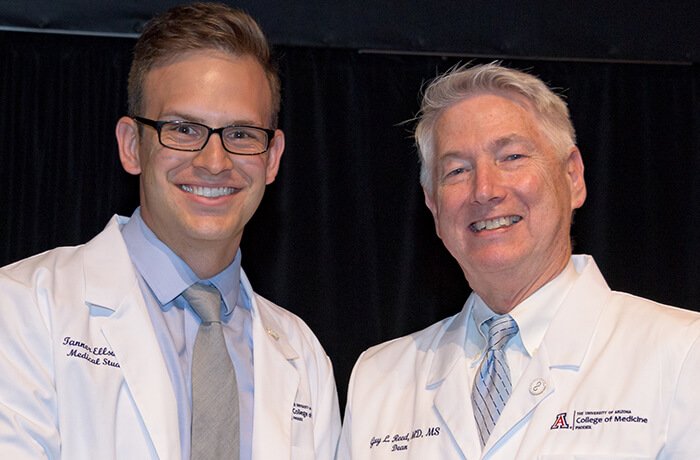 Tanner Ellsworth with Dean Reed at the White Coat Ceremony for the Class of 2021