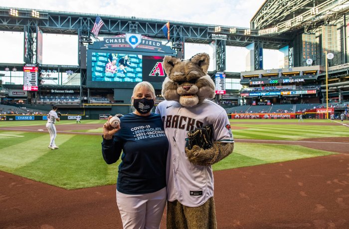 Marjorie Bessel, MD, with the Diamondbacks' Mascot Baxter