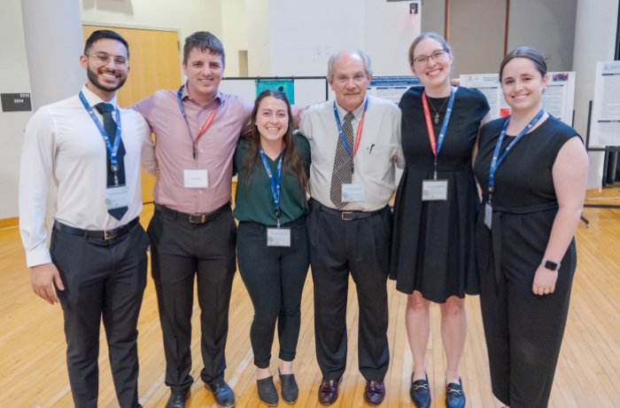 Dr. Beyda with the presenting medical students at the conference