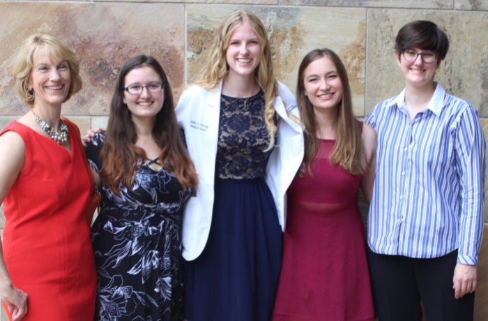 Julia Ghering at the Class of 2022 White Coat Ceremony with Her Family