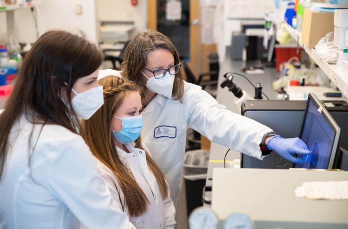 Alexandra Garvin, PhD, Dana Floyd, and Taben Hale, PhD, in the Hale Laboratory