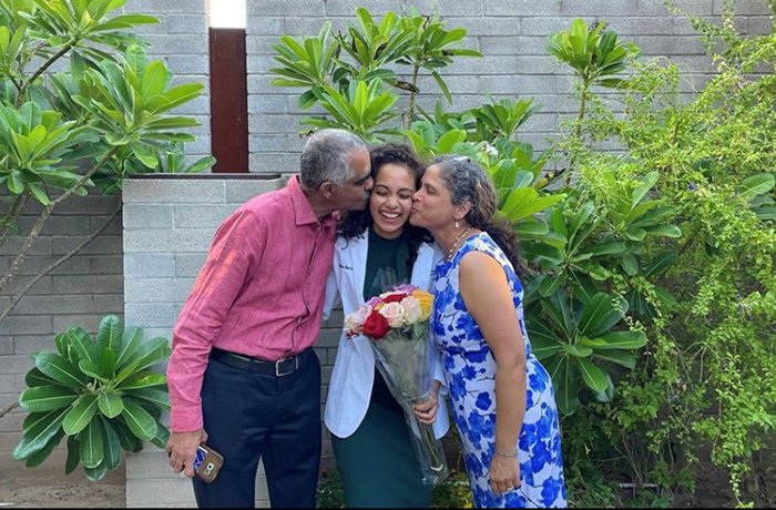 Prathima Harve with her parents at the Class of 2024 White Coat Ceremony