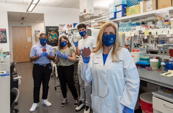 Melissa Herbst-Kralovetz, PhD, and the Roadtrip Nation Crew in Her Lab