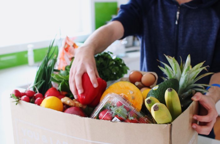 Box filled with fruit and vegetables