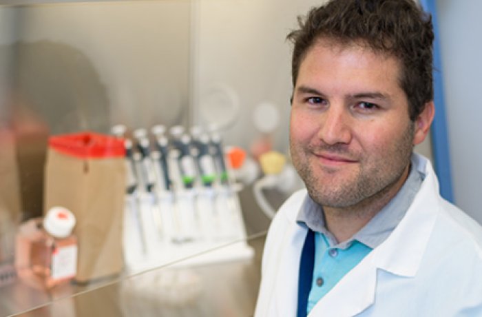 researcher Jerome Lacombe, PhD, looking into the camera