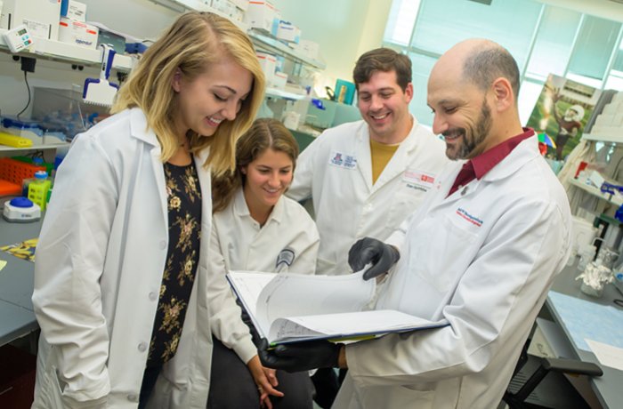 Jonathan Lifshitz, PhD, with colleagues 