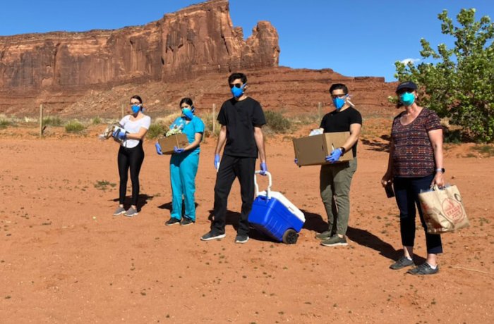 Jayne Peterson, MD (Far Right), Delivering Supplies with the Aid of Medical Students and Residents