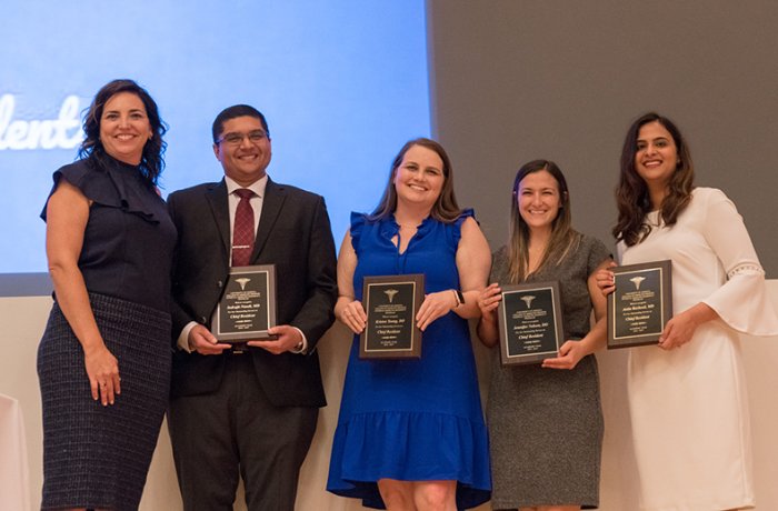 Dr. Nelson, Second from Right, with Her Fellow Graduates and Dr. Cheryl O'Malley