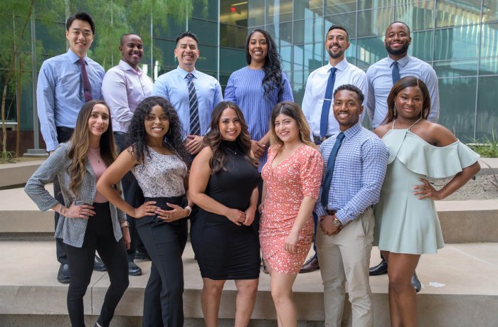 The Pathway Scholars graduates pose for a photo together