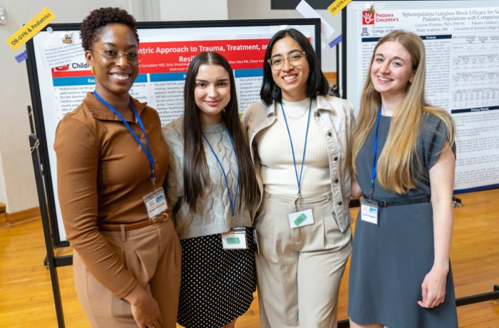 At the Scholarly Project Symposium, medical students engage with faculty and staff, sharing their four-year, hypothesis-driven research projects.