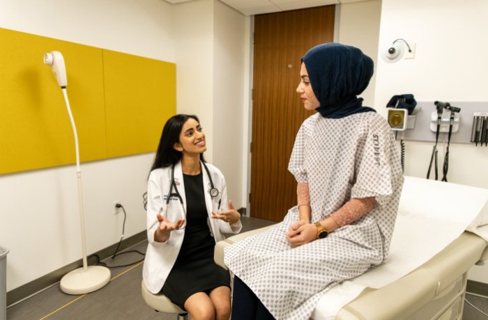 A Medical Student Talking with a Standardized Patient