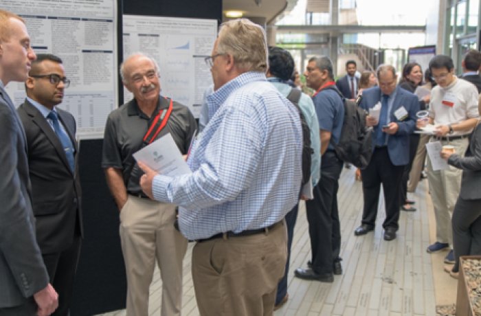 candid shot of group at the annual student research symposium