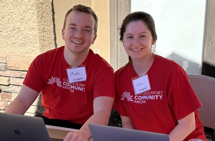 Matthew Steed volunteering with a friend