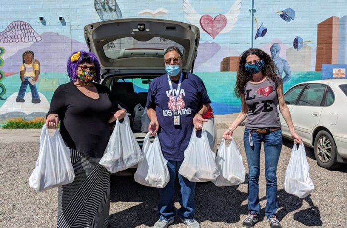 Anne R. Titelbaum, PhD (Far Right), and Arana Wolin (Far Left) Gathering Food for COVID-19 Relief for Homeless Seniors