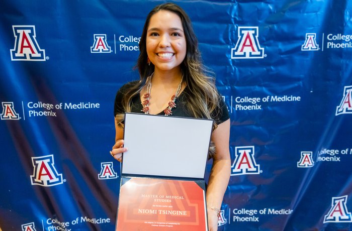 Niomi Tsingine at the Pathway Scholars Program graduation