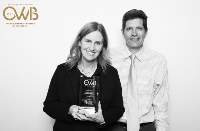 Sharry Veres, MD, MHSM, poses with her husband at the Phoenix Business Journal's Outstanding Women in Business Awards (photo credit: Phoenix Business Journal)