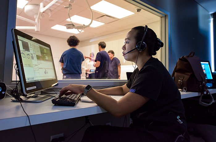 Dr. Wu Running the Simulation Experience from the Control Room