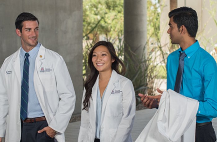 Four Medical Students walking into the HSEB