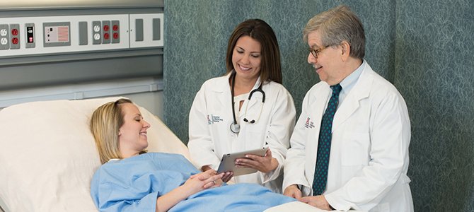 Dr. Liebowitz and a Medical Student Talk with a Patient