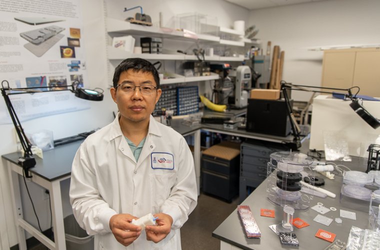 Jian Gu, PhD Jian Gu, PhD