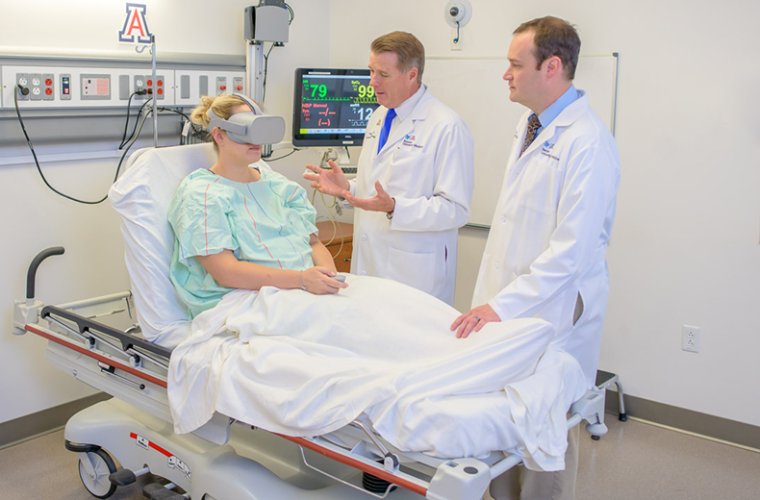 Physicians Oversee Patient Using Virtual Reality