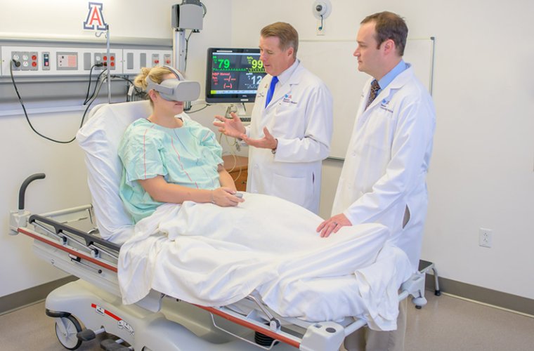 Physicians Oversee Patient Using Virtual Reality Physicians Oversee Patient Using Virtual Reality