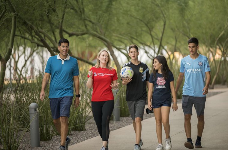 Amy Arias with Her Family on the Phoenix Biomedical Campus (Photo Credit: University of Arizona Health Sciences)