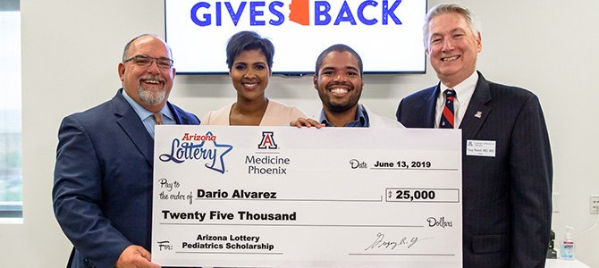Dario with a Representative from the Arizona Lottery and Dean Reed Dario with a Representative from the Arizona Lottery and Dean Reed