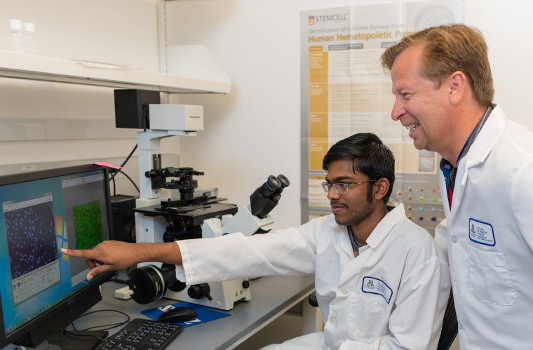 Kurt Gustin, PhD, with intern Kurt Gustin, PhD, with intern