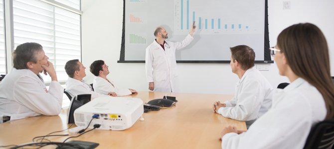 Jonathan Lifshitz, PhD, Presents Statistics to His Team