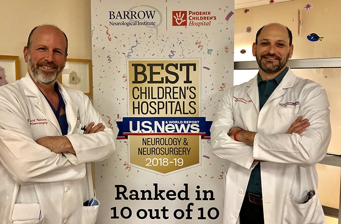 Jonathan Lifshitz, PhD, and P. David Adelson, MD Jonathan Lifshitz, PhD, and P. David Adelson, MD