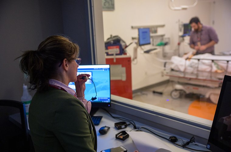 Michelle Munkwitz, MD, Controls a Simulation Scenario from the Control Room