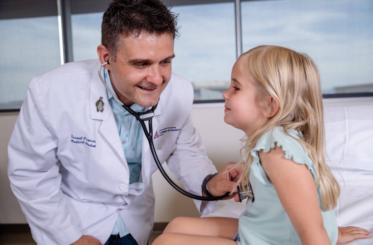 A UArizona College of Medicine – Phoenix medical student works with a pediatric patient in the Center for Simulation and Innovation A UArizona College of Medicine – Phoenix medical student works with a pediatric patient in the Center for Simulation and Innovation